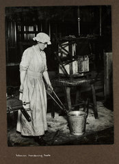 'Woman hardening tools'  1915-1918.