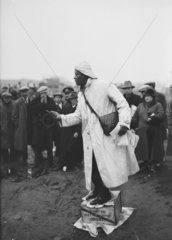 Prince Monolulu performing on a soap box at Epsom Races  20 April 1931.