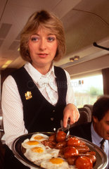 Pullman stewardess with breakfast platter  c 1980s.