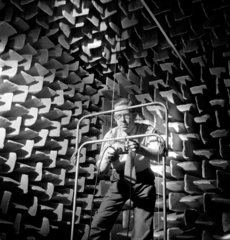 Sound engineer in acoustic chamber  1953.