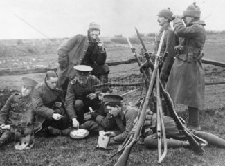 British soldiers playing cards and smoking
