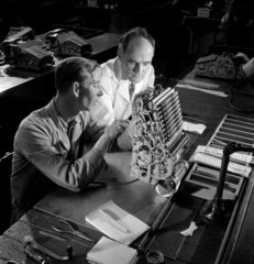 Inspecting an adding machine  NCR  Dundee  1952.