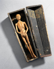 Figure of a man in a coffin  Italy  16th century.
