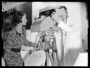Demonstrating an Emitron television camera  Radiolympia  London  1937.