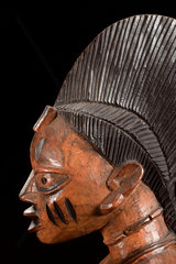 Detail from a carved wooden divination bowl  Nigeria  1880-1920.