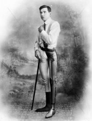 Man wearing an artificial leg  1890-1910.