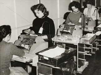Registering postal orders at Vernons Pools  2 July 1955.