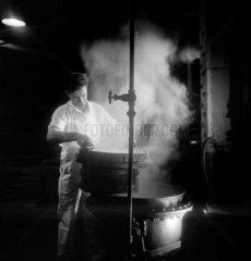 Man boiling a vat of almonds  Caley’s  Norwich 1950.