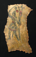 Human skin tattooed with an armed female figure  French  1850-1900.