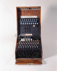 Three-ring Enigma cypher machine in wooden transit case  c 1930s.