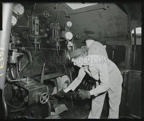 Driver and fireman on the footplate of a steam locomotive  1957.