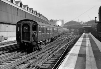 ‘4CEP’ electric locomotive leaving London Victoria for Dover  1963.