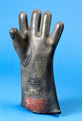 Protective grey rubber glove  1946.