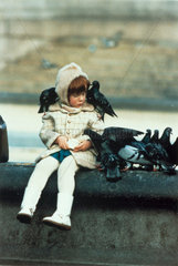 Little girl with pigeons  1960s.