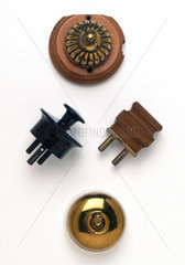 Two switches and two plugs  c 1920s.