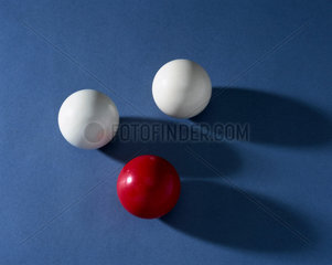 Three billiard balls made of urea formaldehyde  c 1930s.