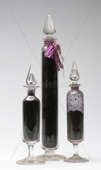 Bottles containing mauveine salts  c 1863-1864.