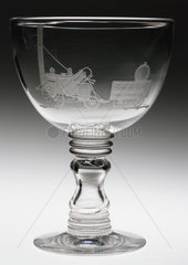 Glass goblet engraved with Robert Stephenson’s ‘Rocket’ locomotive  c 1830.