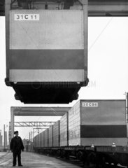 Container being lowered onto a freight train  March 1966.