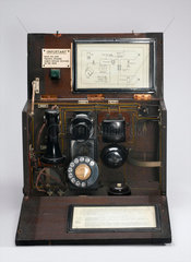 'School telephone' in polished wood case  1921-1940.