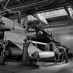Large rolls on laminating machine at Bakelite 1954.