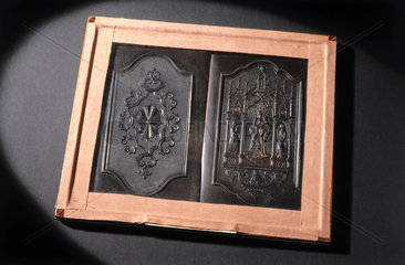 Vulcanite plaques (two in one frame)  c 1840.
