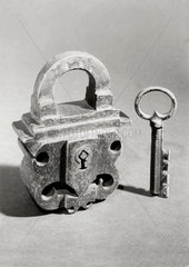 Heavy wrought iron padlock and key  European  c 17th and 18th century.