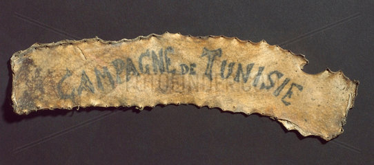 Human skin with tattooed inscription  French  1860-1890.