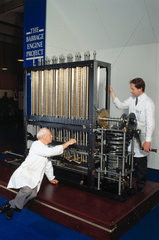 Reg Crick and Barrie Holloway with Babbage's Difference Engine No 2.