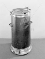 Canister-type vacuum cleaner  c 1910-1914.