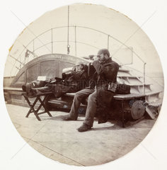 Two men on the deck of a ship  c 1890.