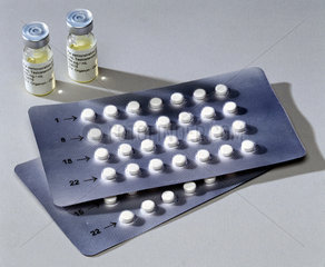 Prototype male pills and bottles of testosterone solution  2001.