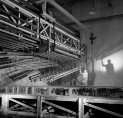 Steel girder production: man in paint shop  1959.