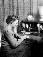 Woman at a writing desk  1949.