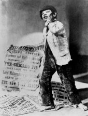 Newspaper boy with placard  1871.