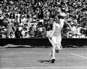 Tennis player Mrs Sperling in action at Wimbledon  1935.