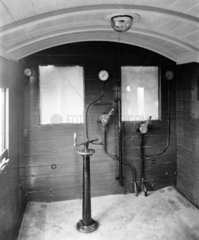 The brake levers inside a brake van  24 March 1909.