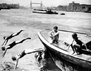 Boys swimming in the River Thames at Rotherhithe  London  26 July 1934.