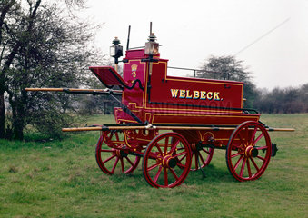 Horse-drawn manual fire engine  1866.