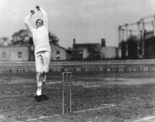 Bowler about to release the ball  c 1920s.