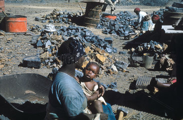 Woman and baby at Glen Allen asbestos mine  South Africa  1955-1960.