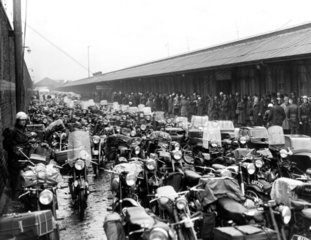 Motorcycles waiting to be loaded onto a ferry  Liverpool  June 1955.