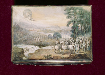 A balloon in a rural landscape  with river and horsemen  late 18th century.