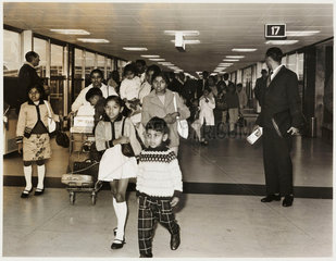 Kenyan Asian families arriving at Heathrow  c 1967.