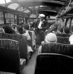 Passengers in a tourist bus at St Pancras Station  London  1950.