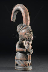 Wooden figure representing the god Eshu  Nigeria  1880-1920.