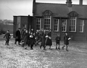Children leave their school in Disley  Ches