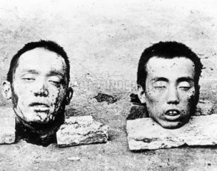 Two heads of Chinese soldiers  September 1937.