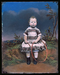 Boy with hoop  opalotype  late 19th century.