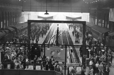 Passengers arriving at Liverpool Street station  London  9.00 am  29 June 1949.
